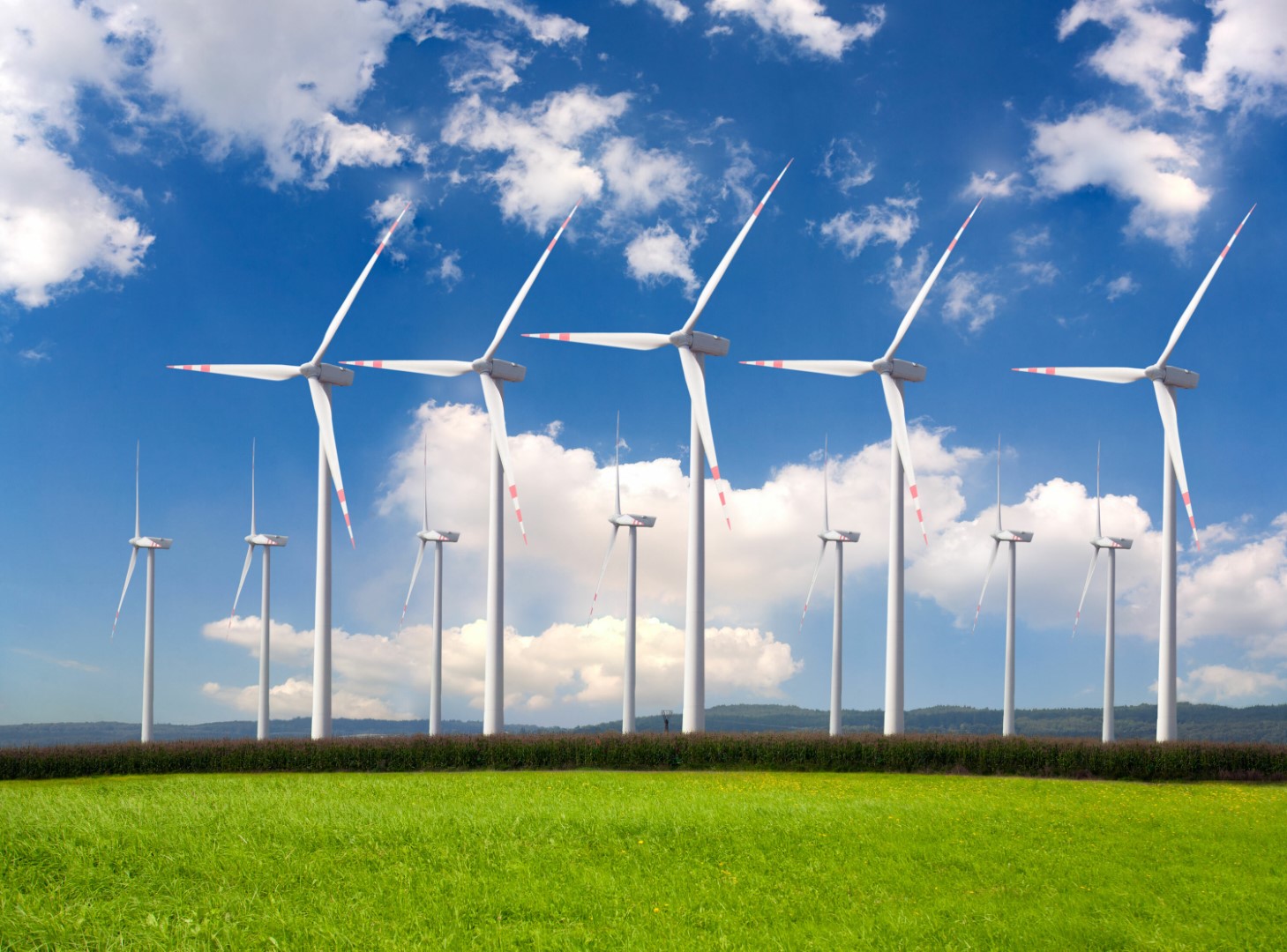 Windfarm against a blue sky background